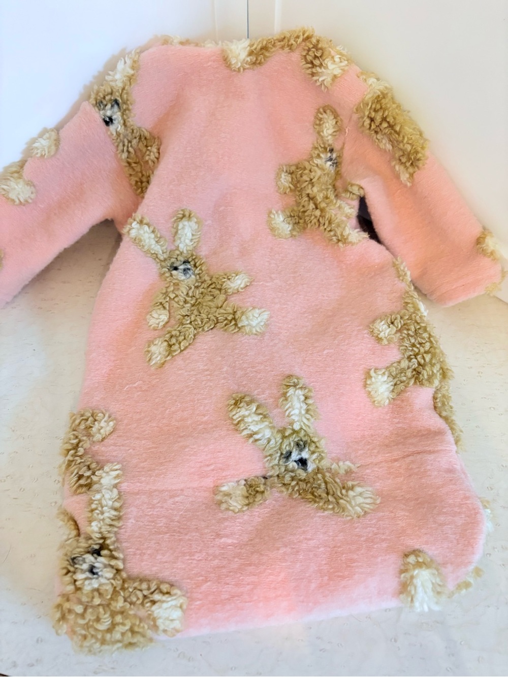 vintage pink baby sleep gown featuring a textured teddy-style bunny pattern